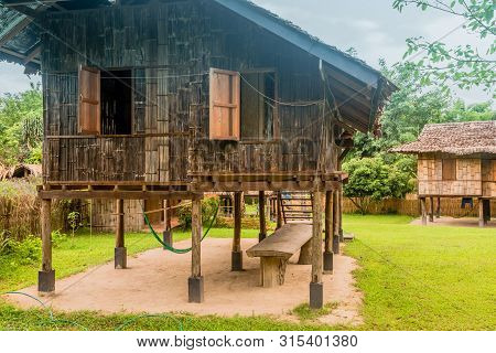 Chiang Mai, Thailand; July 2, 2019: Traditional Wooden House On Stilts With Open Windows Located At 