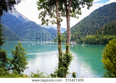 Beautiful Mountain Lake Ritsa. Ritsa Lake In The Mountains Of The Caucasus, In The Northwestern Part