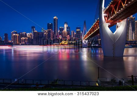 Chongqing, China - July 24, 2019: Panoramic View Of Chongqing Skyline And Chaotianmen Bridge Over Ya