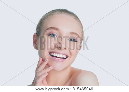 Cute young lady while isolated on white background
