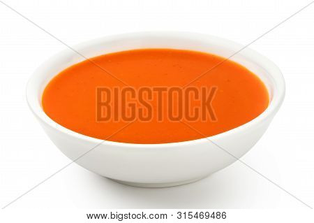 Peri Peri Chilli Sauce In A White Ceramic Bowl Isolated On White.