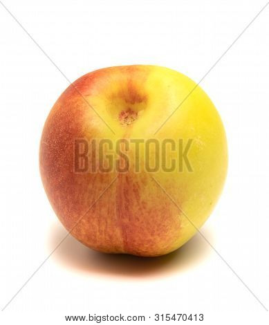 Nectarine Fruit Lies On A White Background