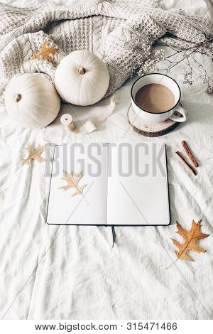 Autumn Breakfast In Bed Composition. Blank Open Notebook Mockup. Cup Of Coffee, White Pumpkins, Swea