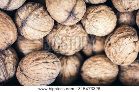 Natural Walnut In Shell Background Pattern Texture