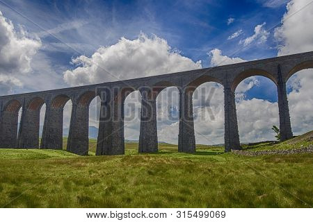 View Of Large Victorian Viaduct In Rural Countryside Scenery