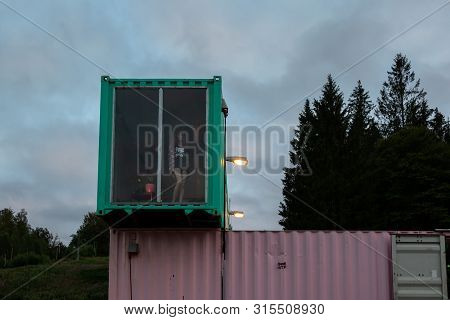 Ullared, Sweden - July 15, 2019: Outdoor Front Facade Night View Of  A Two Storey Container Home Bui
