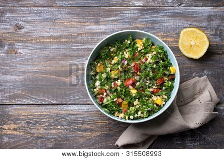 Original Oriental Salad Tabbouleh With Cabbage Cale, Parsley, Bulgur, Tomatoes And Red Onions On A W