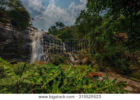 Wachirathan Waterfall Surrounded By Lush Tropical Forest In Doi Inthanon National Park Near Chiang M