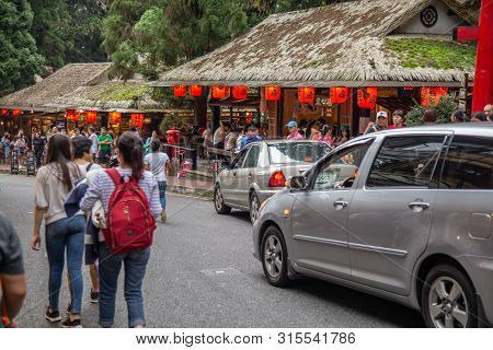 Travelers At Xitou Monster Village