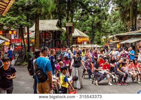 Travelers At Xitou Monster Village