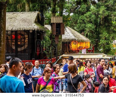 Travelers At Xitou Monster Village