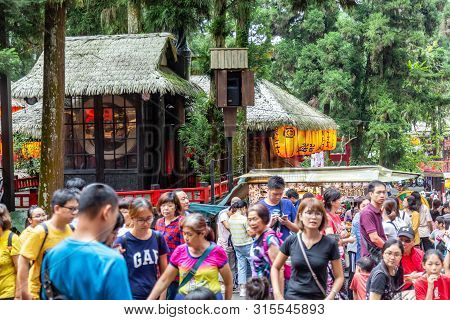 Travelers At Xitou Monster Village