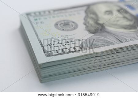 Lots Of Us Dollar Bank Notes With 100 Bill Notes As For Financial And Business, Currency Background.