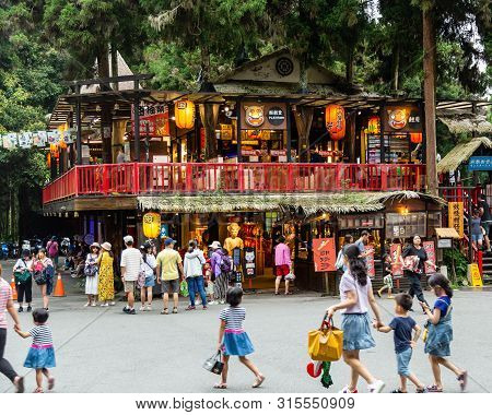 Travelers At Xitou Monster Village