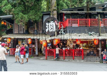 Travelers At Xitou Monster Village