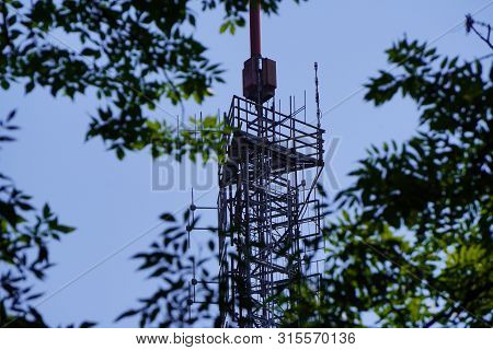 High Tv Tower Or Radio To Transmit Signals To Citizens. Modern Technology For Convenience.