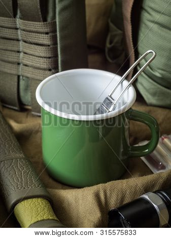 Modern Outdoor Survival Kit In Green Tones