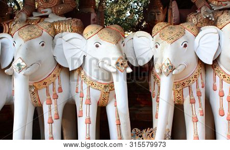 Rows of old stone statues of elephants, Maha Bodhi Ta Htaung monastery, famous Bodhi Tataung temple complex, Monywa, Sagaing Region, Myanmar (Burma)