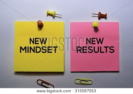 New Mindset - New Results Text On Sticky Notes Isolated On Office Desk