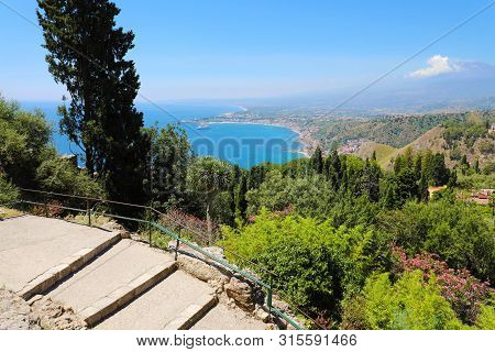 Beautiful Aerial View Of Sicily Landscape With Etna Volcano On The Background. Blue Mediterranean Se