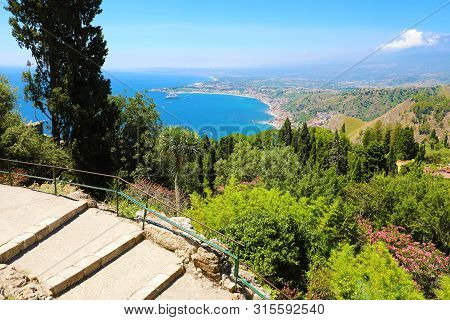 Beautiful Aerial View Of Sicily Coastline. Blue Mediterranean Sea And Green Mountians, Taormina, Sic