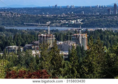 Construction Site In The Green Zone Of North Vancouver At The Background Of Burrard Inlet And Vancou