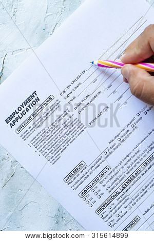Hand Filling Standard Application For Employment. Hr, Hiring, Applicant Filling Job Application. Hr,