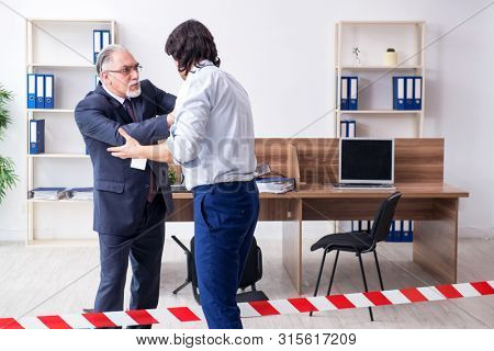Forensic investigator investigating theft in the office