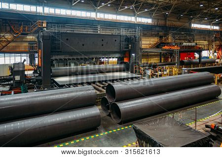Pipe Formation By Using Roll Bending Machine.