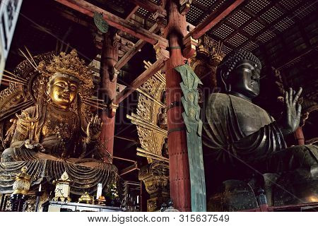 Nara, Japan - April 19th, 2018: View Of The Giant Buddha Inside The Daibutsuden, Great Buddha Hall, 