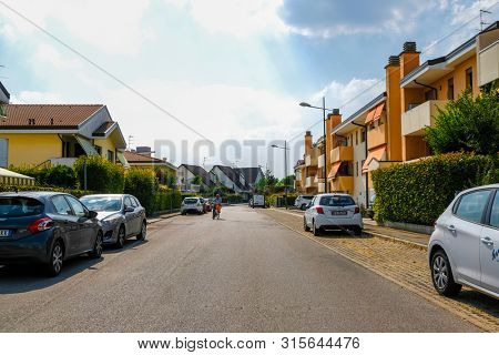 Rovigo, Italy - July, 7, 2019: cars parked on the street in Rovigo, Italy