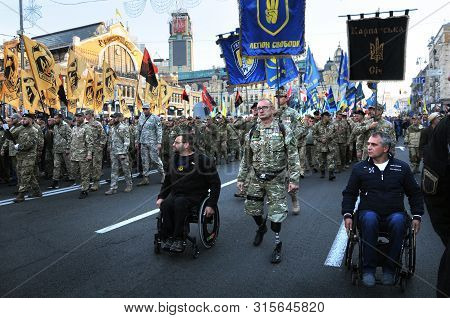Kyiv, Ukraine - October 14, 2018. Veterans Of The Russian-ukrainian War In The Center Of Kiev On Def