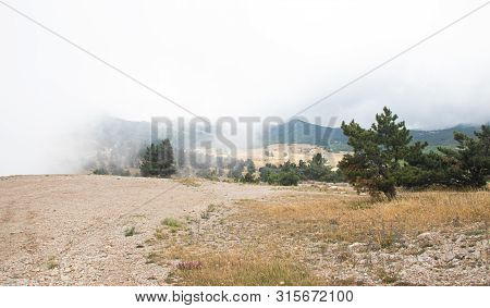 Ai-petri Mountain In The Fog. High Mountain. Crimea. Russian Mountains. Low Clouds. Beautiful Mounta