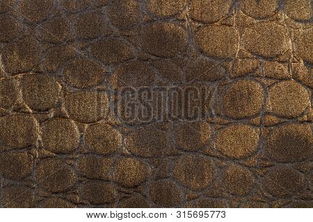 A Brown Lether Cloth With Reptile Texture