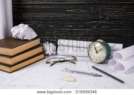 Rolls With Drawings, Design Books And Several Drawing Tools