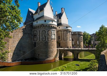 Nantes, France - May 12, 2019: The Main Entrance Of Castle Of The Dukes Of Brittany In Nantes. The C