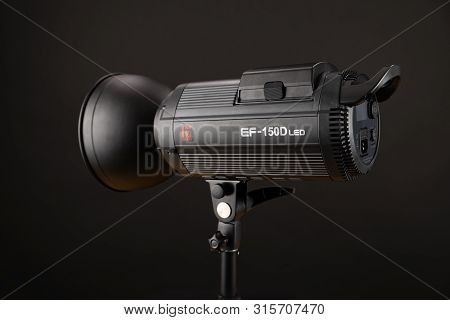 Studio Flash Lighting On Black Background. Jinbei