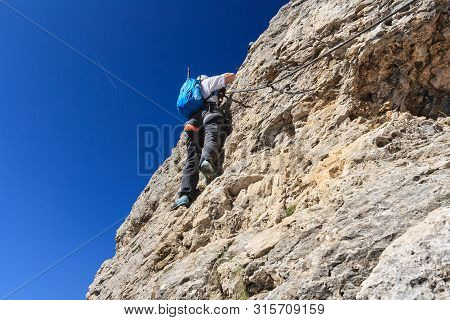 Dolomiti - Female Climber On Cir V Via Ferrata