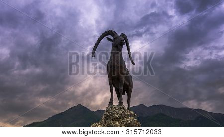 Russia, Arshan June 2019, A Sculpture Of A Mountain Goat In The Resort Of Arshan In Buryatia On The 