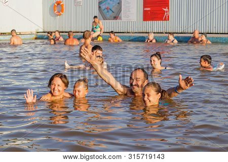Tyumen, Russia - July 31, 2019: Family Takes Wellness Baths In The Thermal Pool.