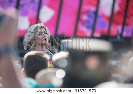 Woman Vocalist Singing Live