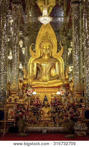 Uthai Thani. Thailand - June 19, 2019  Golden Buddha Statue At Cathedral Glass.wat Tha-sung The Best