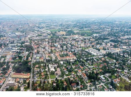Aerial View Of City Graz From Helicopter Drone With District Eggenberg On A Cloudy Summer Day In Aus