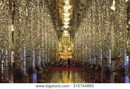 Uthai Thani. Thailand - June 19, 2019  Golden Buddha Statue At Cathedral Glass.wat Tha-sung The Best