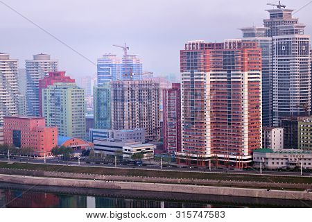 Pyongyang, North Korea -  April 30, 2019: Skyline And Taedong River In The Morning Fog. View On Mode