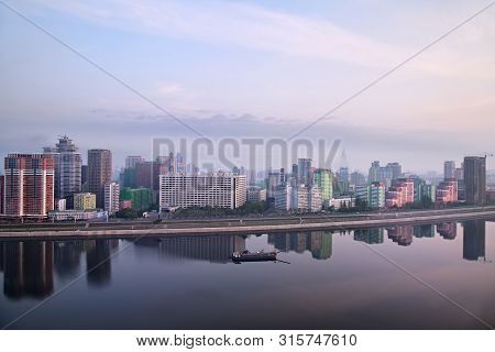 Pyongyang, North Korea -  April 30, 2019: Skyline And Taedong River In The Morning Fog. View On Mode