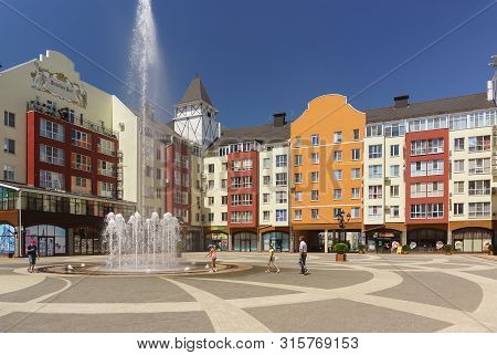 German Village, Krasnodar, Russia - June 09, 2019: Children Play Near The Fountain In I. M. Rotman S