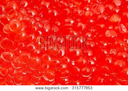 Food Background - Salted Russian Red Caviar Of Sockeye Salmon Fish Close-up