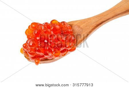Above View Of Little Wooden Spoon With Salted Russian Red Caviar Of Sockeye Salmon Fish Isolated On 