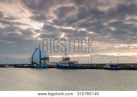 Hel, Poland- 31 January 2015: View Of The Seaport And Breakwater. Boats And Cutters Moored In The Po